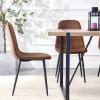 A set of 4 modern medieval style restaurant cushioned side chairs, equipped with soft cushions and black metal legs, suitable for kitchens, lounges
